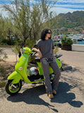 DAXUEN Dark grey women's flared pants with graphic details — model photo