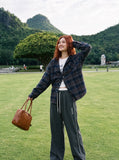 DAXUEN dark grey pinstriped wide-leg pants — model photo
