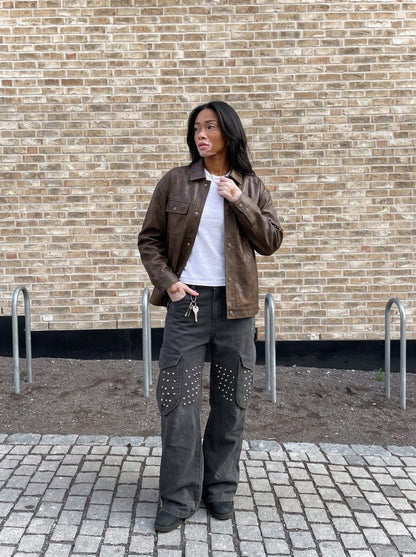 DAXUEN dark grey wide-leg cargo pants with silver spikes — model photo