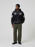 DAXUEN Dark Harvest oversized zip hoodie with graphics — model photo