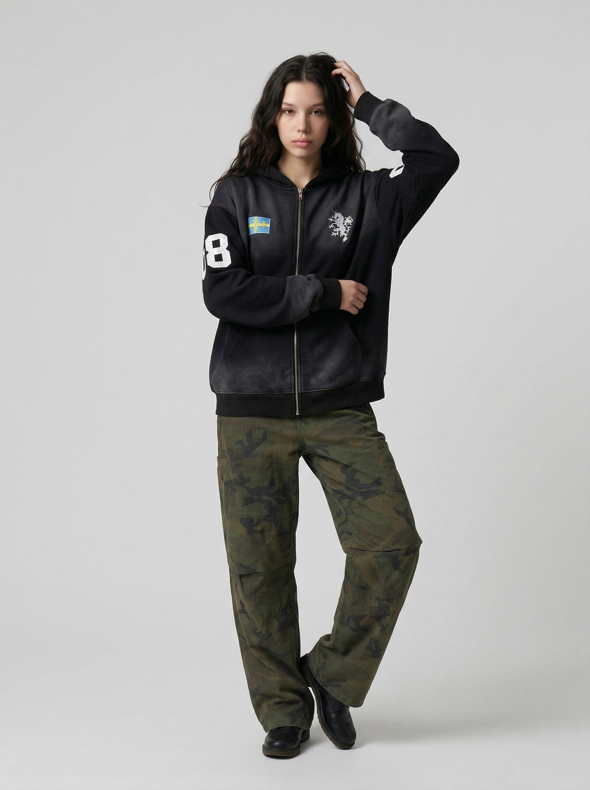 DAXUEN Dark Harvest oversized zip hoodie with graphics — model photo