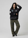 DAXUEN Dark Harvest oversized zip hoodie with graphics — model photo