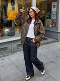 DAXUEN Dark indigo wide-leg denim pants with embroidery and studs — model photo