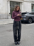 DAXUEN dark plum mock neck athletic top — model photo
