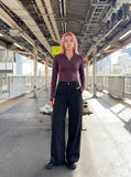 DAXUEN dark plum mock neck athletic top — model photo