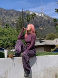 DAXUEN dark plum mock neck athletic top — model photo