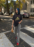 DAXUEN faded charcoal black oversized graphic tee — model photo