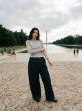DAXUEN dark wash wide-leg denim trousers — model photo