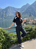 DAXUEN dark wash wide-leg denim trousers — model photo