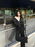 DAXUEN Deconstructed bomber jacket in navy blue and black — model photo