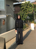 DAXUEN Deconstructed bomber jacket in navy blue and black — model photo