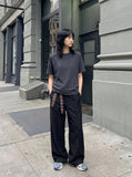 DAXUEN Deconstructed seam short sleeve t-shirt — model photo