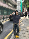 DAXUEN Deconstructed seam short sleeve t-shirt — model photo