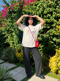 DAXUEN Deconstructed vintage graphic T-shirt — model photo