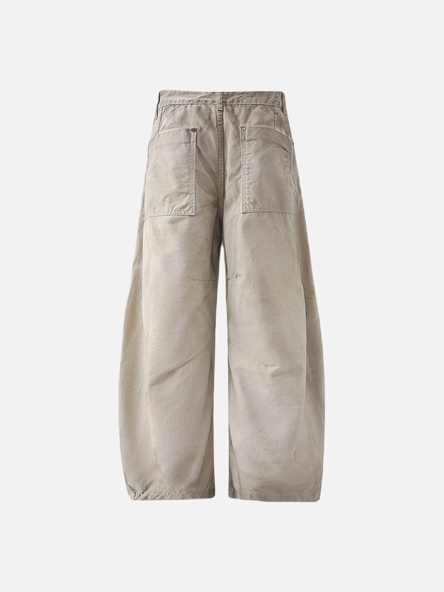Deconstructed wide-leg cargo pants in light beige
