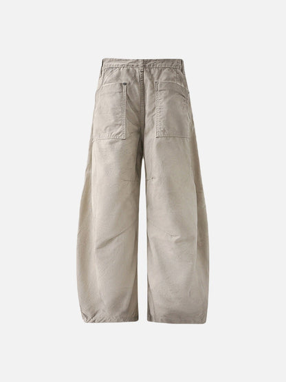 Deconstructed wide-leg cargo pants in light beige