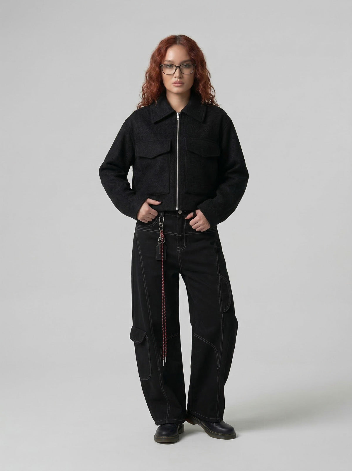 DAXUEN Deconstructed wide-leg trousers with contrasting stitching — model photo