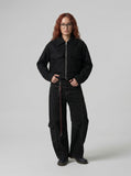 DAXUEN Deconstructed wide-leg trousers with contrasting stitching — model photo