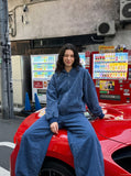 DAXUEN deep blue oversized barrel-leg pants — model photo