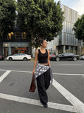 DAXUEN beige deep U-neck ribbed knit tank top — model photo