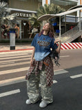 DAXUEN Denim ombre short-sleeve embroidered crewneck tee — model photo
