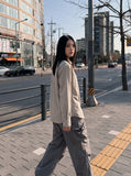 DAXUEN light beige diagonal plaid long-sleeved shirt — model photo