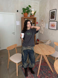 DAXUEN pink oversized digital clock graphic tee — model photo