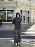 DAXUEN pink oversized digital clock graphic tee — model photo
