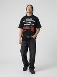 DAXUEN Oversized graphic print black and cream t-shirt — model photo