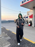 DAXUEN Oversized long sleeve top with bold graphics — model photo