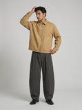 DAXUEN tan relaxed jacket with patterned trim — model photo