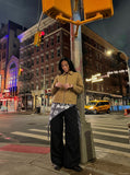 DAXUEN tan relaxed jacket with patterned trim — model photo