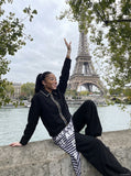 DAXUEN tan relaxed jacket with patterned trim — model photo