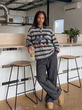 DAXUEN grey oversized distressed '65' graphic polo shirt — model photo
