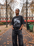 DAXUEN washed black oversized abstract skull graphic tee — model photo
