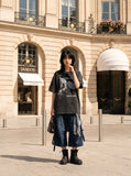 DAXUEN washed black oversized abstract skull graphic tee — model photo
