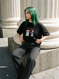 DAXUEN black oversized distressed abstract starburst graphic tee — model photo