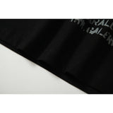 DAXUEN black oversized t-shirt with distressed alphanumeric graphic