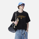 DAXUEN faded light purple oversized 'ANM' graphic tee