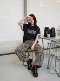 DAXUEN faded light purple oversized 'ANM' graphic tee — model photo