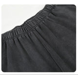 DAXUEN washed black wide-leg sweatpants with distressed back graphic