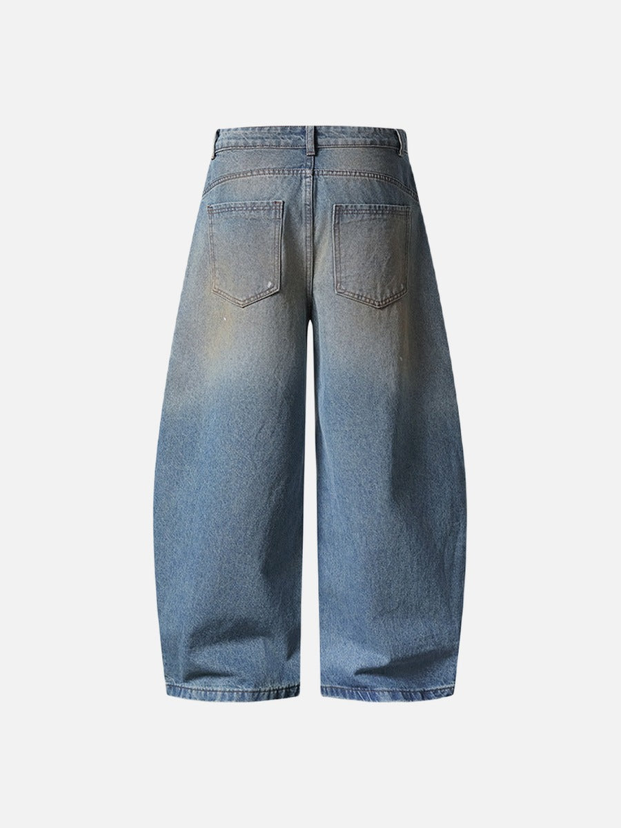 Distressed baggy denim jeans with wide leg cut