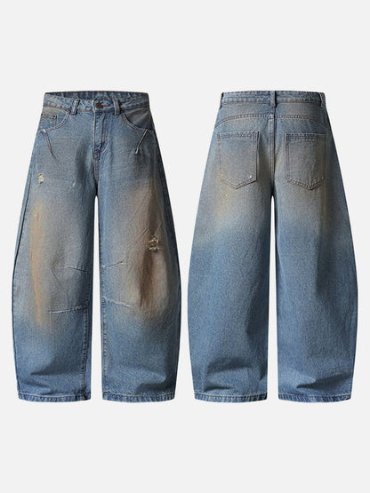 Distressed baggy denim jeans with wide leg cut