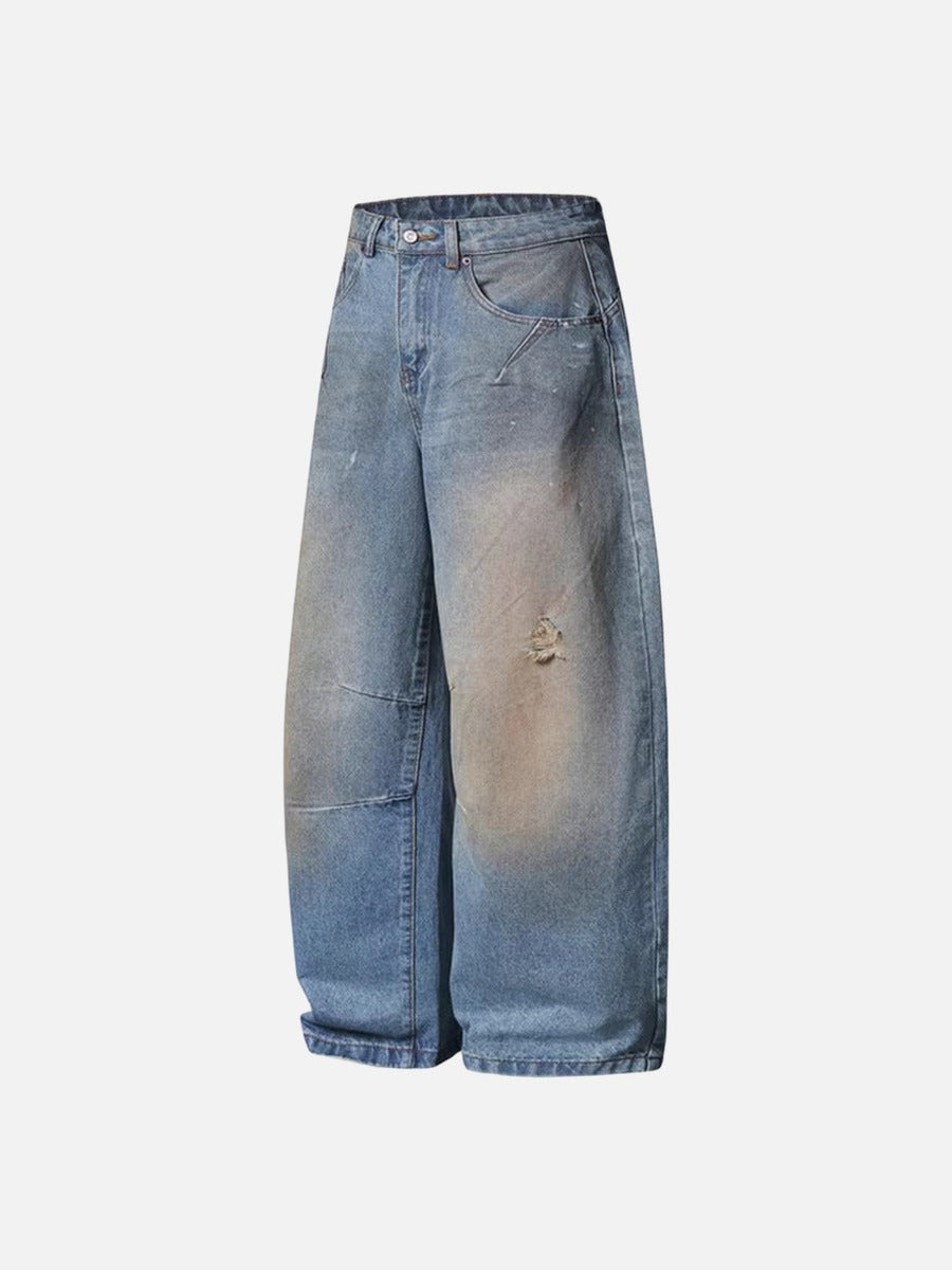 Distressed baggy denim jeans with wide leg cut
