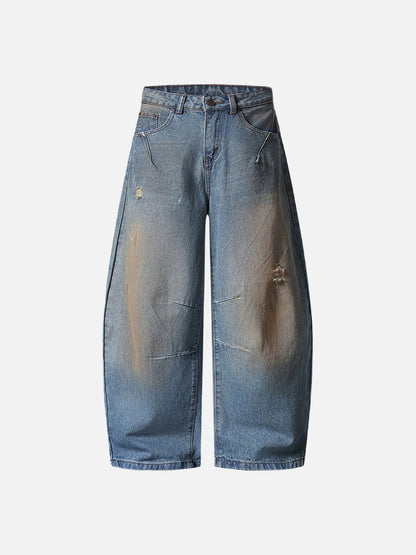 Distressed baggy denim jeans with wide leg cut