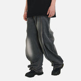 DAXUEN Distressed baggy wide-leg jeans in dark grey denim — model photo