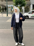 DAXUEN Distressed high-waisted wide-leg balloon jeans — model photo