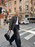 DAXUEN Distressed high-waisted wide-leg balloon jeans — model photo