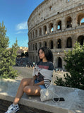 DAXUEN Distressed oversized T-shirt with band graphic — model photo