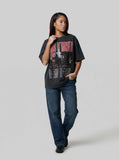 DAXUEN Distressed oversized T-shirt with band graphic — model photo